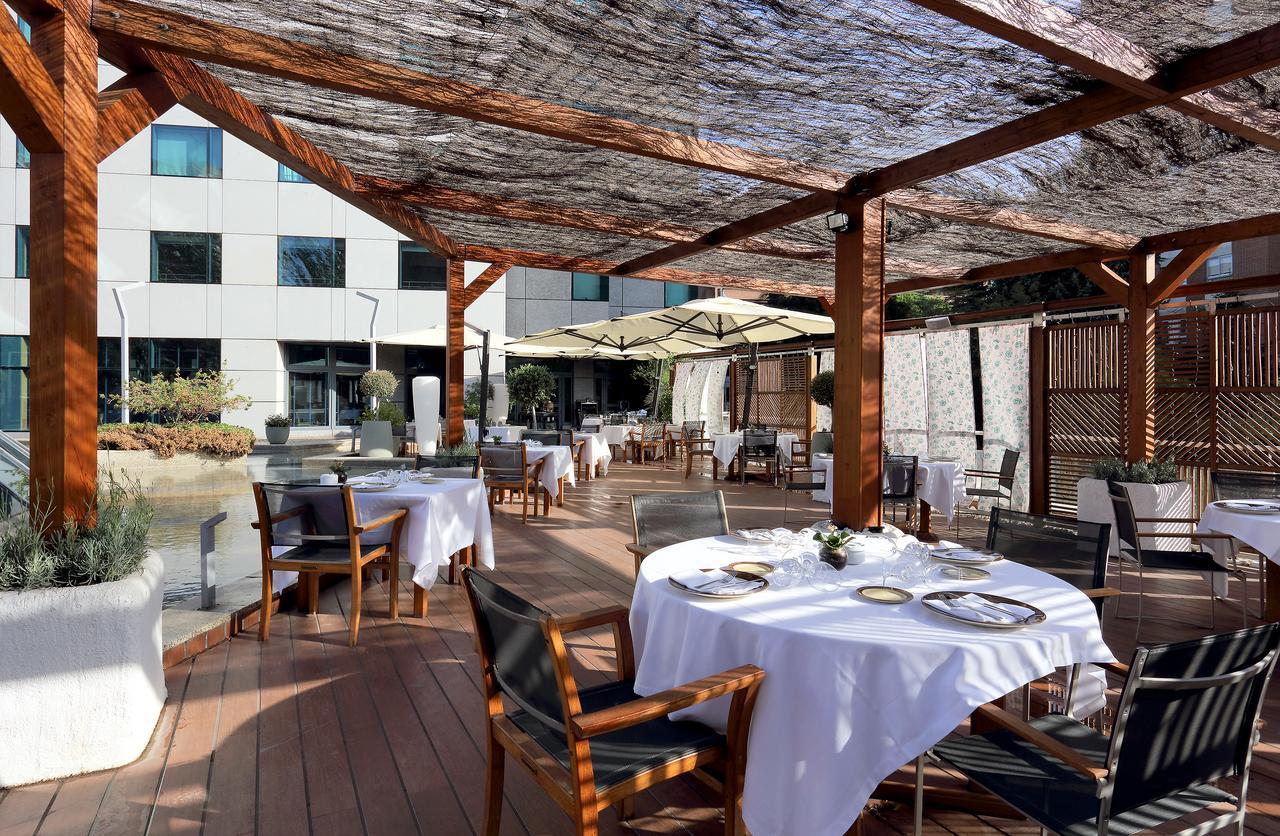ยูโรสตาร์ สวีทส์ มิราซิเอร่า Hotel มาดริด ภายนอก รูปภาพ Restaurant